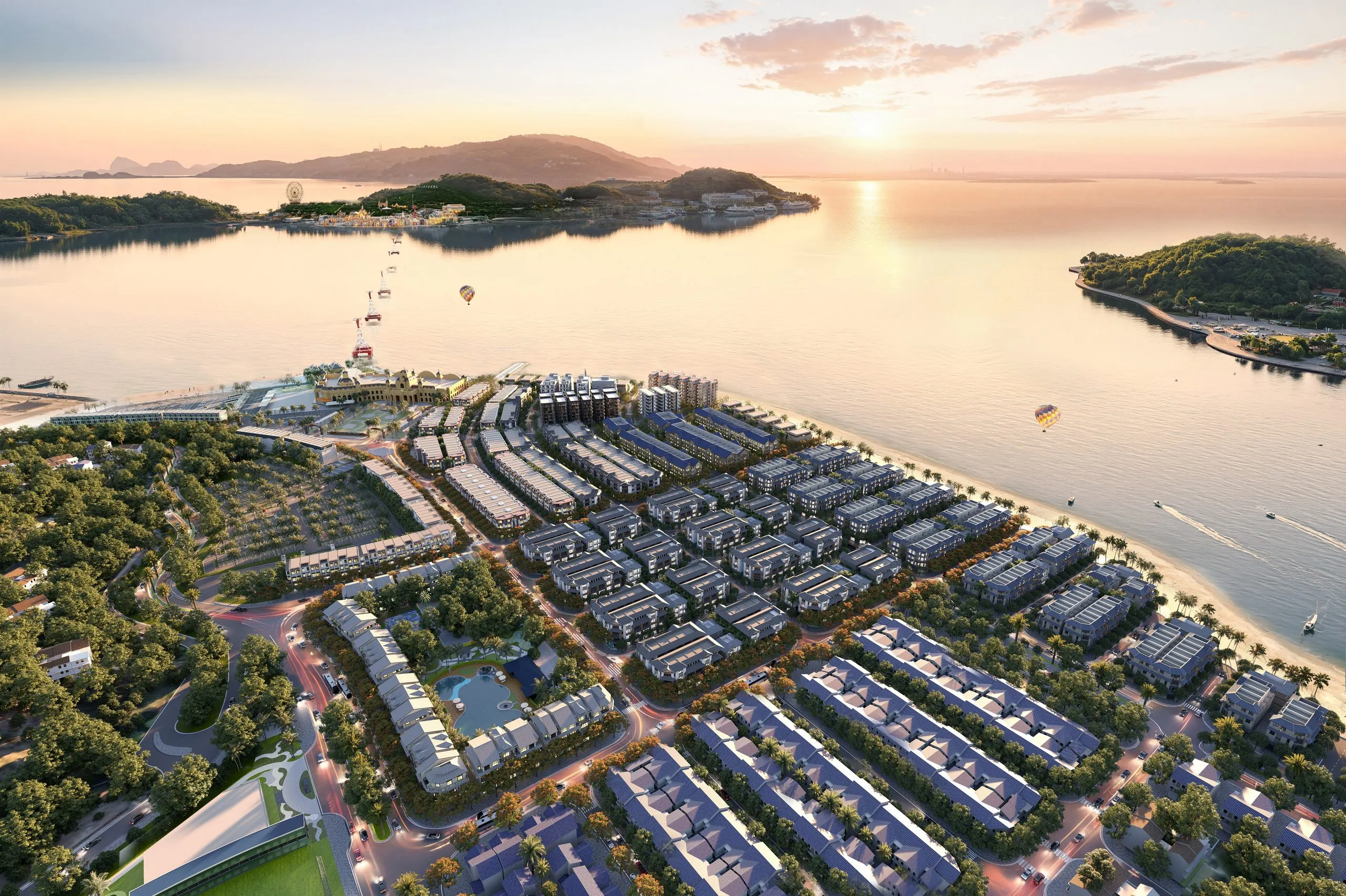 Toàn cảnh Vinhomes Pearl Bay bên vịnh Nha Trang lúc hoàng hôn, nhìn ra đảo Hòn Tre